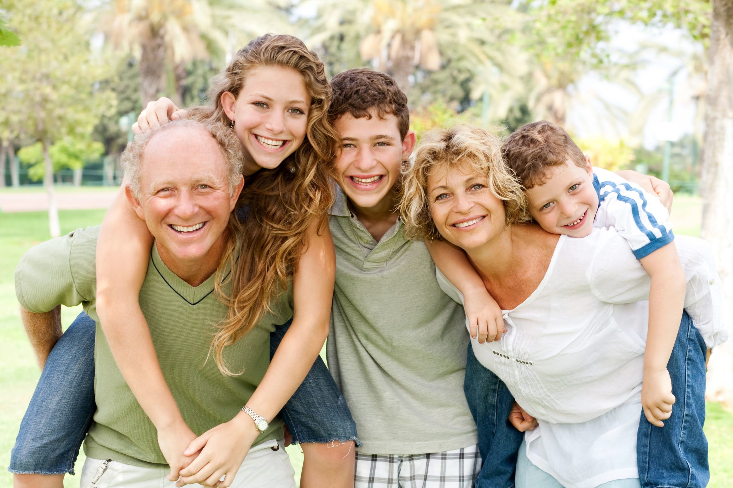 Portrait of happy family - Belleview Dental Associates